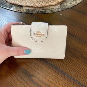 Coach medium size wallet.